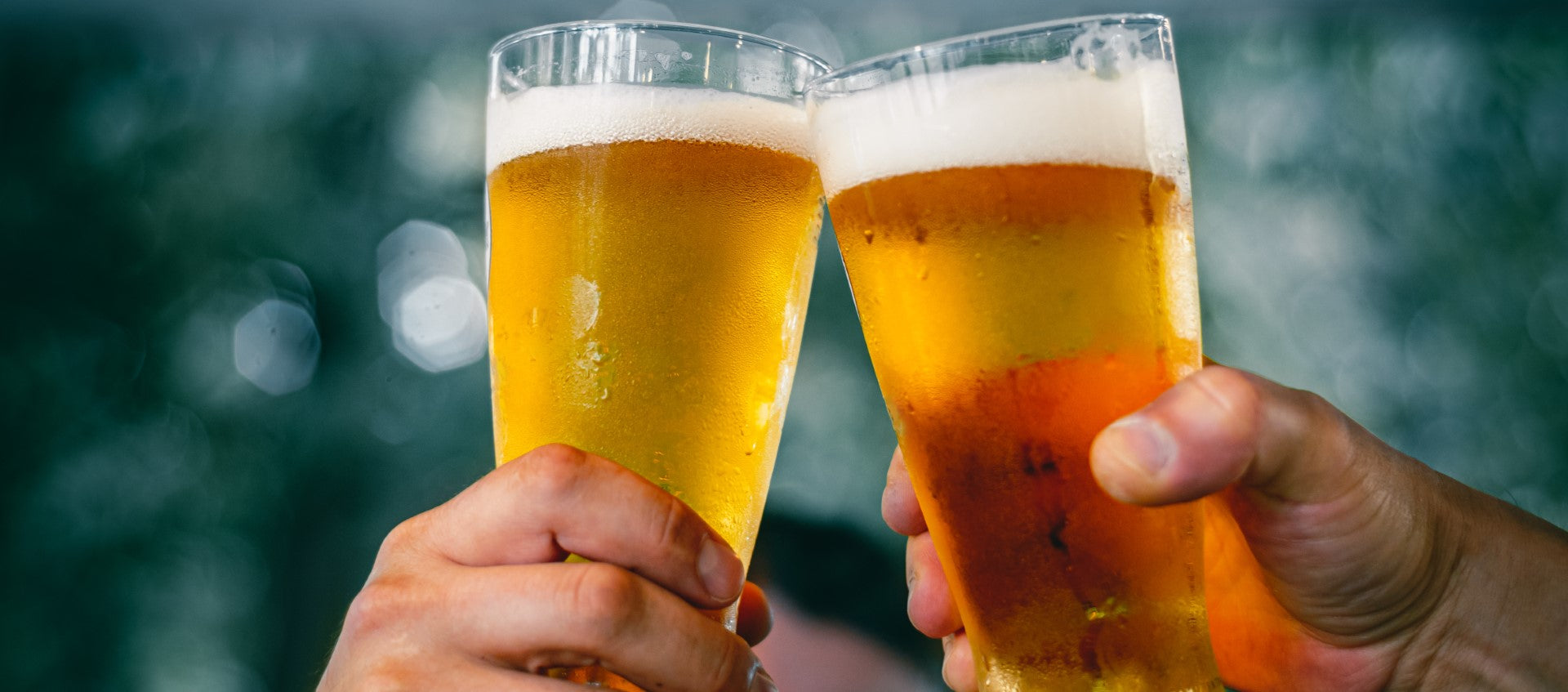2 beers that are being used to cheers